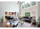 Open-concept living room showcasing hardwood floors, high ceilings, and natural light at 3045 Moss Stone Lane Sw Ln, Marietta, GA 30064