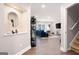 Spacious living room featuring recessed lighting, hardwood floors, and a blue sofa at 3045 Moss Stone Lane Sw Ln, Marietta, GA 30064