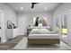 Cozy bedroom with decor, soft rug, and a door leading to a balcony or patio at 569 Middle Sw St, Atlanta, GA 30310