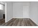 Spacious bedroom with wood-look flooring and neutral paint, ready for personalization at 569 Middle Sw St, Atlanta, GA 30310