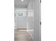 Hallway with white closet doors and natural light, showcasing a functional layout at 569 Middle Sw St, Atlanta, GA 30310
