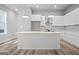 Modern kitchen with an island, stainless steel appliances, and stylish backsplash, perfect for cooking and entertaining at 569 Middle Sw St, Atlanta, GA 30310