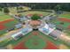 Aerial view of a baseball complex featuring well-maintained fields, dugouts, and common areas at 10980 Pinehigh Dr, Alpharetta, GA 30022
