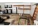 Spacious garage featuring overhead storage, work area, and ample room for vehicles and projects at 10980 Pinehigh Dr, Alpharetta, GA 30022