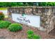 Stone park sign for Johns Creek Ocee Park at 10900 Buice Road surrounded by lush greenery at 10980 Pinehigh Dr, Alpharetta, GA 30022