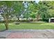 Lush backyard space featuring a fire pit and fenced in perimeter at 110 Chesterfield Ct, Fayetteville, GA 30214