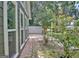 Gray house with flower garden and a concrete patio in backyard at 110 Chesterfield Ct, Fayetteville, GA 30214