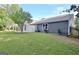 Expansive backyard with a well-maintained lawn, a privacy fence, and mature trees at 110 Chesterfield Ct, Fayetteville, GA 30214