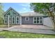 Grassy backyard features a spacious patio, ideal for outdoor entertaining and relaxation at 110 Chesterfield Ct, Fayetteville, GA 30214
