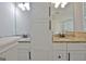 Bathroom featuring double sinks with granite countertops and dark hardware at 110 Chesterfield Ct, Fayetteville, GA 30214