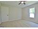 Bedroom with carpet, ceiling fan and natural light at 110 Chesterfield Ct, Fayetteville, GA 30214