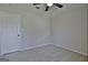 This bedroom features a ceiling fan, neutral walls, and plush carpeting for a cozy feel at 110 Chesterfield Ct, Fayetteville, GA 30214