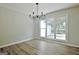 Dining room with chandelier and lots of natural light at 110 Chesterfield Ct, Fayetteville, GA 30214