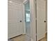Hallway entrance with a view into a bedroom with bright natural light at 110 Chesterfield Ct, Fayetteville, GA 30214