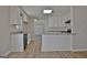 Modern kitchen with white cabinets and granite countertops at 110 Chesterfield Ct, Fayetteville, GA 30214
