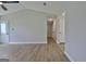 Spacious living room with wood-look flooring and neutral paint at 110 Chesterfield Ct, Fayetteville, GA 30214