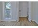 Empty room with vinyl floors and access to the utilities at 110 Chesterfield Ct, Fayetteville, GA 30214