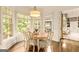 Bright breakfast nook with a view of the backyard, adjacent to the kitchen at 2230 Cambridge Hill Ct, Dacula, GA 30019