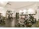 Home gym featuring modern equipment, including weight racks, benches, and machines for comprehensive fitness at 2230 Cambridge Hill Ct, Dacula, GA 30019