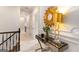 Hallway with decorative table and accents at 2230 Cambridge Hill Ct, Dacula, GA 30019