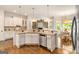 Large kitchen with hardwood floors, stainless appliances, and lots of counter space at 2230 Cambridge Hill Ct, Dacula, GA 30019