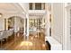 Bright open living space with hardwood floors and decorative archways at 2230 Cambridge Hill Ct, Dacula, GA 30019