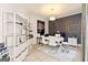 Bright office space featuring built-in shelves, desk, and ample storage at 2230 Cambridge Hill Ct, Dacula, GA 30019