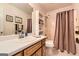 Bathroom featuring a shower/tub combo and a single sink vanity at 180 Moseley Crossing Dr, Stockbridge, GA 30281
