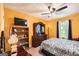 Bedroom featuring a large window and a traditional dark wood dresser at 180 Moseley Crossing Dr, Stockbridge, GA 30281