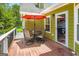 Inviting backyard deck with outdoor seating and dining area, perfect for entertaining at 180 Moseley Crossing Dr, Stockbridge, GA 30281