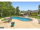 A private in-ground pool and beautifully landscaped backyard, perfect for relaxation at 180 Moseley Crossing Dr, Stockbridge, GA 30281