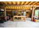 Spacious garage featuring a workbench, storage cabinets, and ample space for vehicles and projects at 7093 Vaughn Rd, Canton, GA 30115
