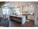 Spacious kitchen with large center island, stainless appliances, and modern pendant lighting at 7093 Vaughn Rd, Canton, GA 30115