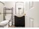 Bathroom boasts a modern vanity and convenient storage, creating a functional and stylish space at 1055 Avalon Dr, Lawrenceville, GA 30044