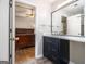 Beautiful bathroom with a modern vanity, offering a glimpse into a relaxing bedroom space at 1055 Avalon Dr, Lawrenceville, GA 30044