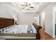 Spacious main bedroom with hardwood floors, tray ceiling, and a serene, inviting atmosphere at 1055 Avalon Dr, Lawrenceville, GA 30044