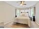The cozy bedroom includes a stylish headboard at 121 Fairway Overlook, Woodstock, GA 30188