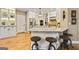 Kitchen with stainless appliances, marble countertops, and breakfast bar at 121 Fairway Overlook, Woodstock, GA 30188