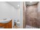 The bathroom features tiled shower and a modern vanity sink at 2917 Rockingham Nw Dr, Atlanta, GA 30327