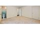 Spacious bedroom with neutral carpet, attached bathroom and ample closet space at 2917 Rockingham Nw Dr, Atlanta, GA 30327