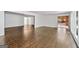 Open living room featuring hardwood floors, natural light, and seamless transition to adjacent rooms at 2917 Rockingham Nw Dr, Atlanta, GA 30327