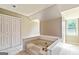 Bright bathroom featuring a large soaking tub, natural light, and a relaxing ambiance at 115 Edgewater Way, Peachtree City, GA 30269