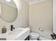 Stylish powder room with a modern vanity, sleek fixtures, and contemporary design at 115 Edgewater Way, Peachtree City, GA 30269