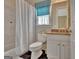 Clean bathroom with shower-tub combination and tiled flooring at 310 Westbourne Dr, Tyrone, GA 30290