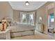 Comfortable bedroom features large windows and natural light at 310 Westbourne Dr, Tyrone, GA 30290