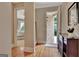 Inviting foyer with hardwood floors and neutral paint at 310 Westbourne Dr, Tyrone, GA 30290