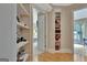 Hallway features a built-in display case and views into other rooms at 310 Westbourne Dr, Tyrone, GA 30290