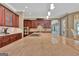The gourmet kitchen features stone countertops, stainless steel appliances, and custom wood cabinets at 310 Westbourne Dr, Tyrone, GA 30290