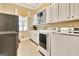 Well-equipped laundry room with modern appliances and storage at 310 Westbourne Dr, Tyrone, GA 30290