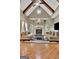 Beautiful living room featuring a fireplace and vaulted ceilings at 310 Westbourne Dr, Tyrone, GA 30290